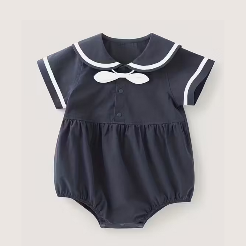 Navy Sailor-Inspired Baby Girl Cotton Romper – Summer Classic with Bow Detail - Emilie Bramly