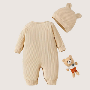 Back view of beige ribbed baby bear romper with matching hat