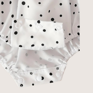 Soft lightweight fabric with black polka dot print for baby romper