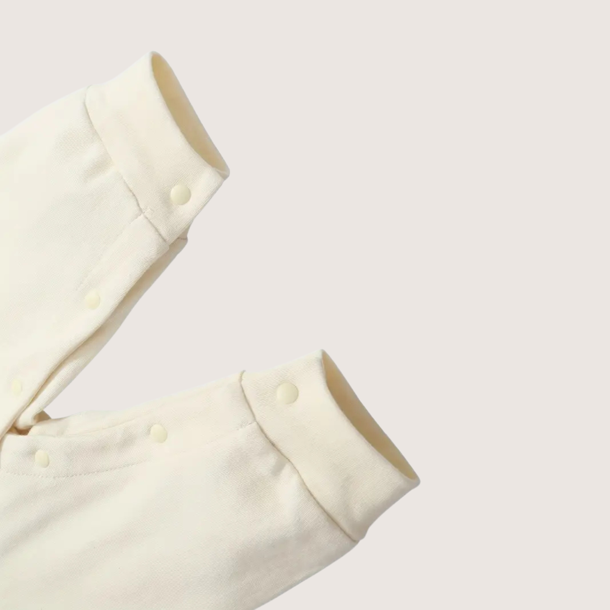 Inner seam and snap button detail – newborn romper