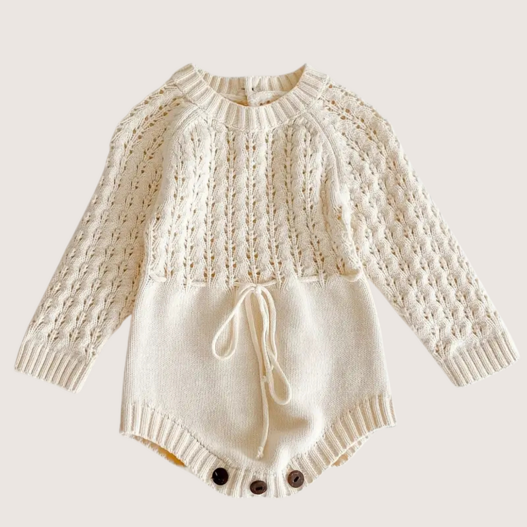 Front view of lightweight knit baby jumpsuit with hollow-weave detail