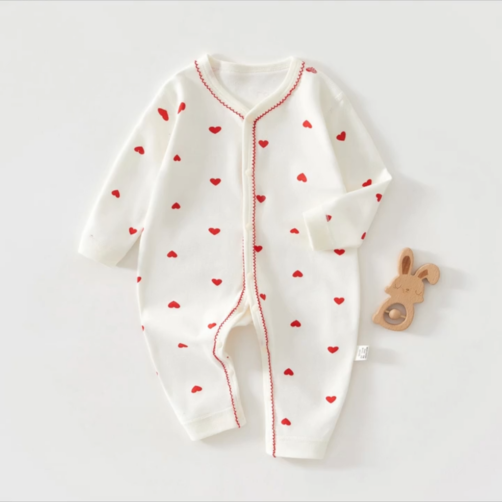 Newborn long-sleeve outfit with heart print, perfect baby gift