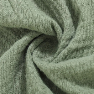 Soft 100% cotton fabric detail of olive green baby romper 