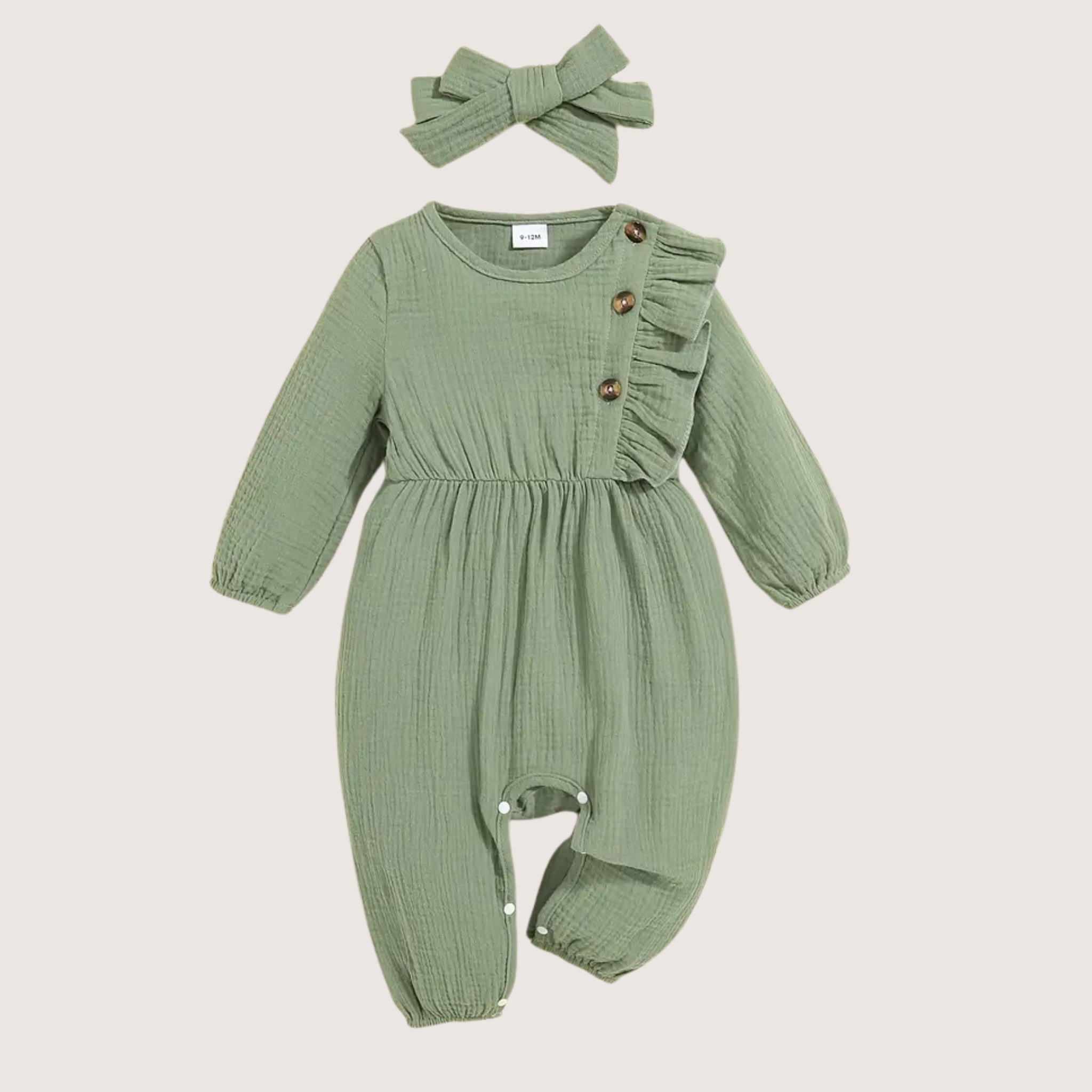Front view of olive green ruffled baby girl romper with buttons and bow