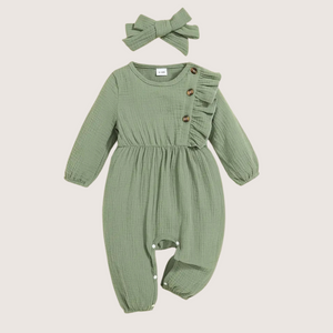 Front view of olive green ruffled baby girl romper with buttons and bow