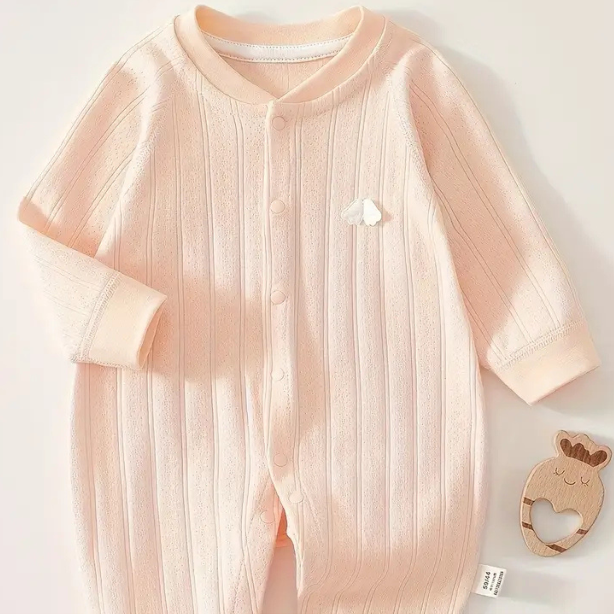 Peach Baby Onesie with Angel Wings – Newborn Clothes for All Seasons